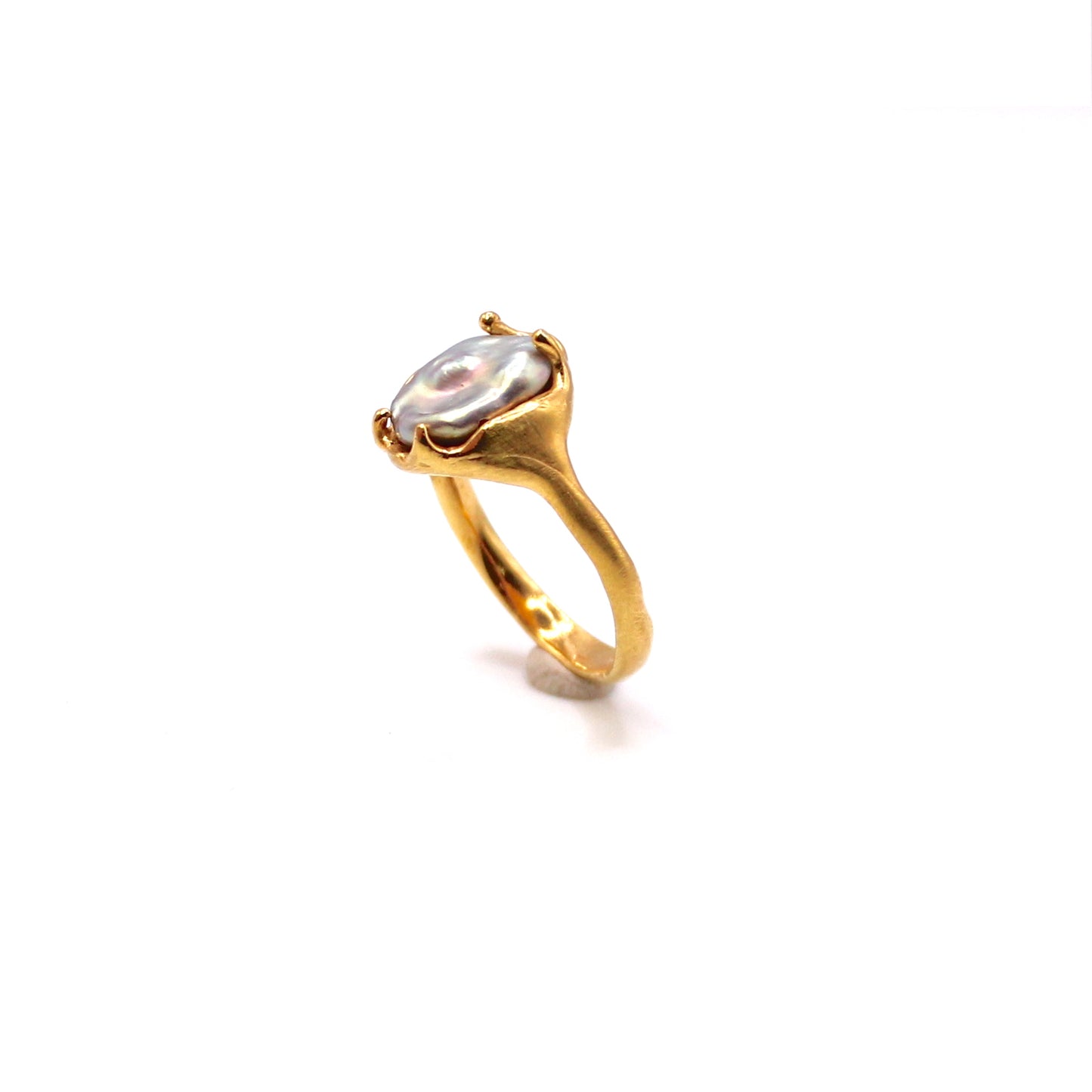 Handmade organic design ring with freshwater pearl, crafted in Lisbon. Minimalist, sculptural jewelry inspired by ocean waves