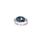Silver ring with a blue gemstone on a white background
