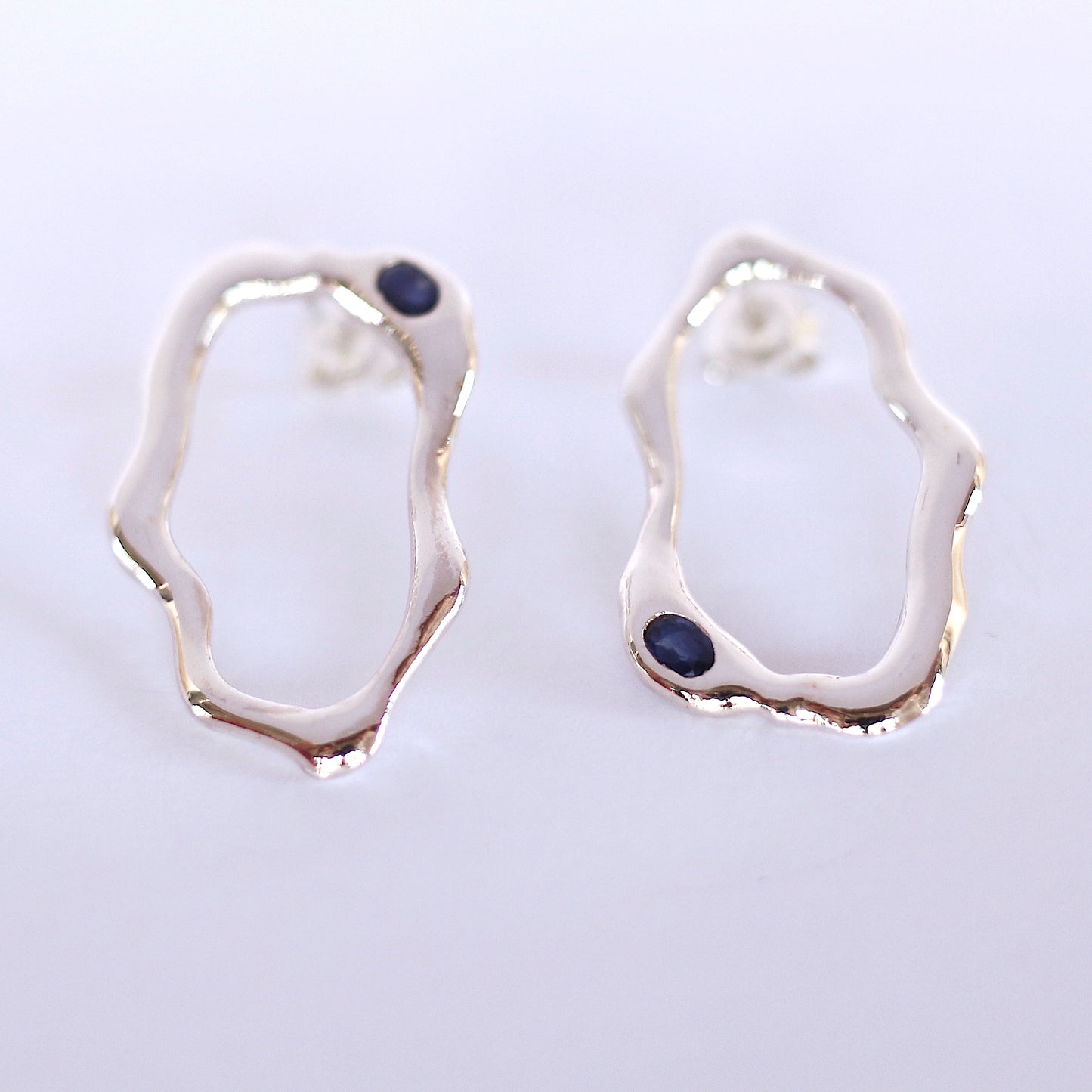 Silver Earrings with blue sapphire handmade jewelry design fluidity statement handcrafted fashion ocean drop