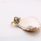 Handmade organic design ring with freshwater pearl, crafted in Lisbon. Minimalist, sculptural jewelry inspired by ocean waves
